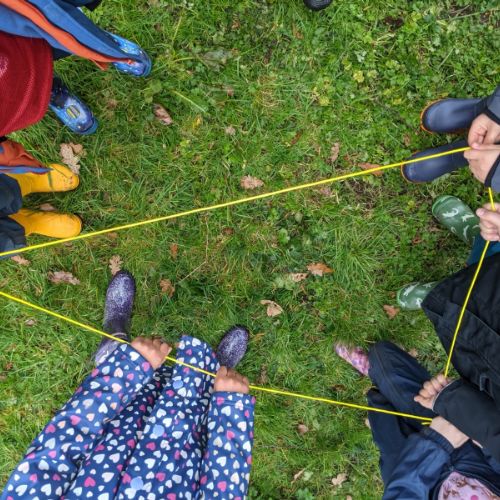 Year 2 working together to make 2D shapes.